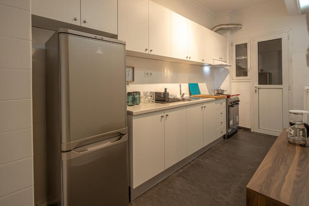 Kuchyňa alebo kuchynka v ubytovaní Plato - Acropolis Residence Apartment