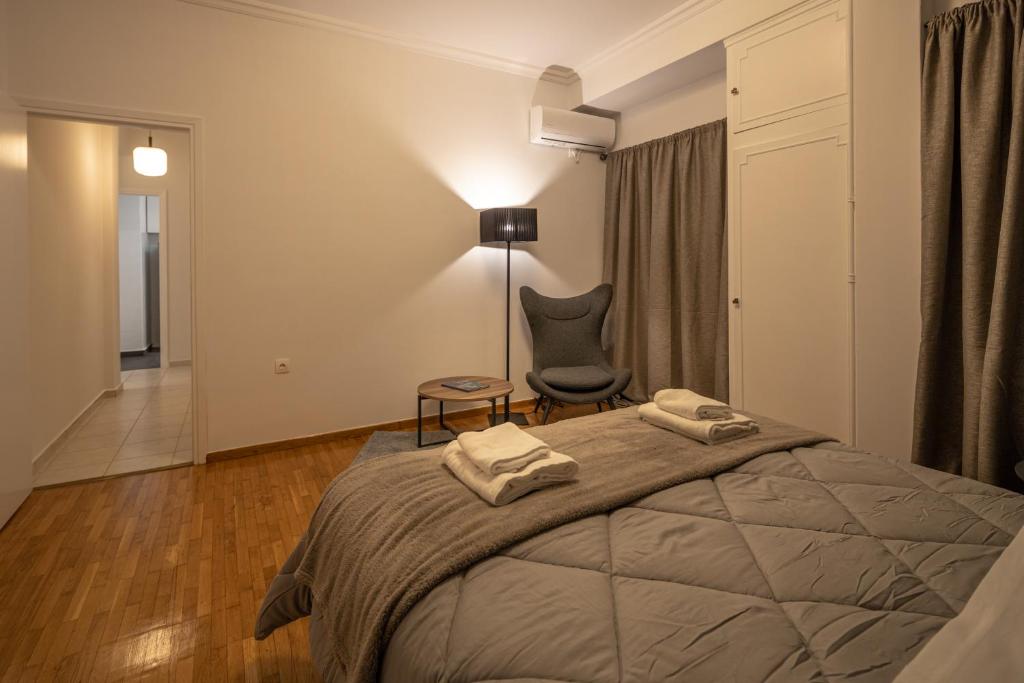 Posteľ alebo postele v izbe v ubytovaní Plato - Acropolis Residence Apartment