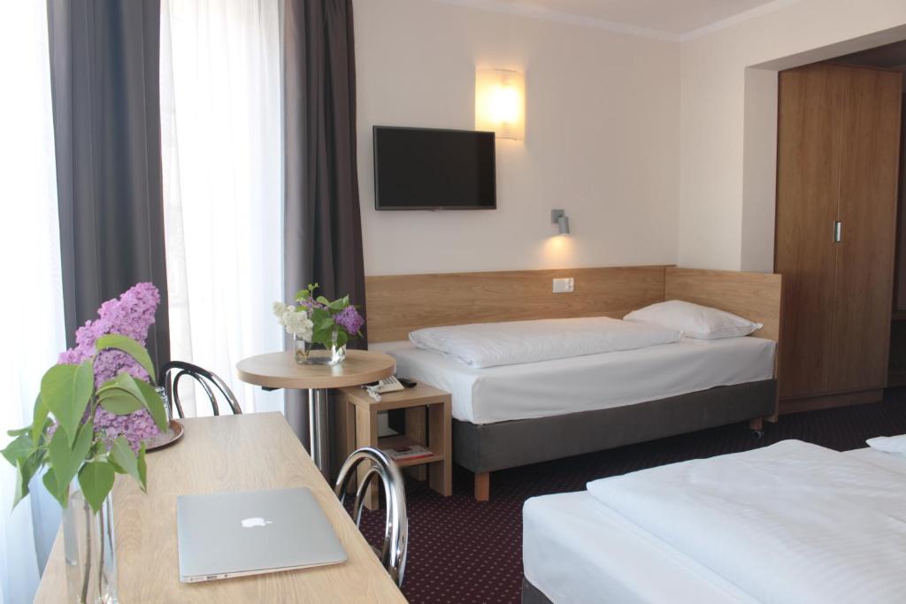 Posteľ alebo postele v izbe v ubytovaní Hotel Huszcza