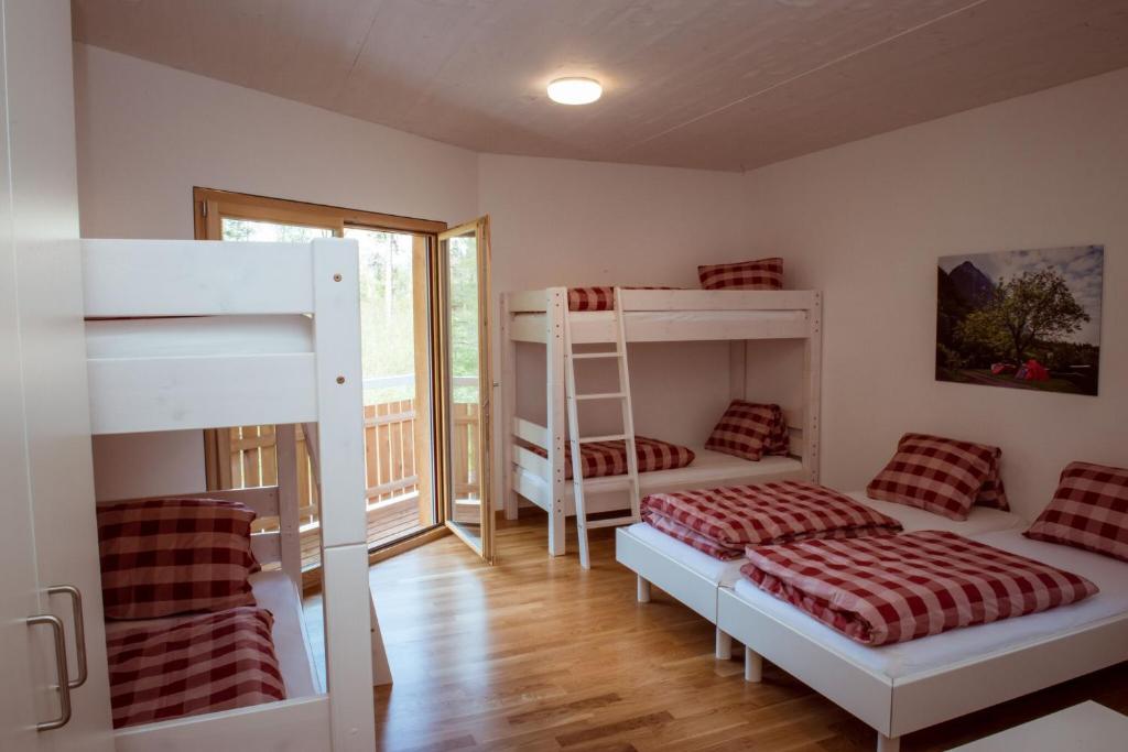 Postel nebo postele na pokoji v ubytování Campingplatz Mittagsspitze