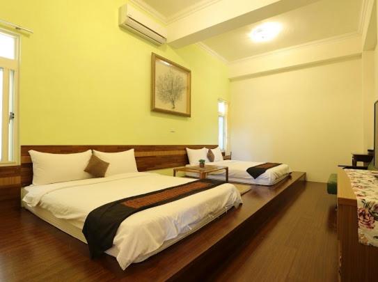 Postel nebo postele na pokoji v ubytování Summertimeph Homestay