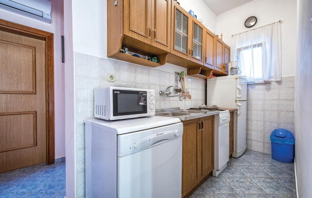 Kuchyň nebo kuchyňský kout v ubytování Apartment Tezak