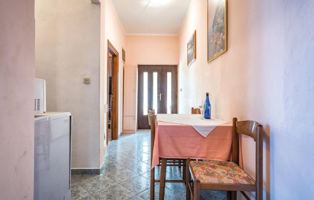 Postel nebo postele na pokoji v ubytování Apartment Tezak
