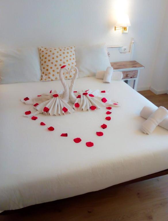 Postel nebo postele na pokoji v ubytování Hotel Mireia