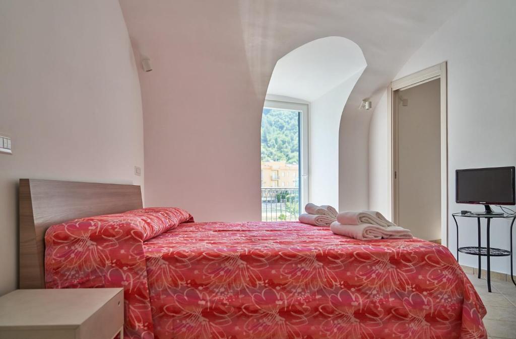 Posteľ alebo postele v izbe v ubytovaní Maiori Dream House 1