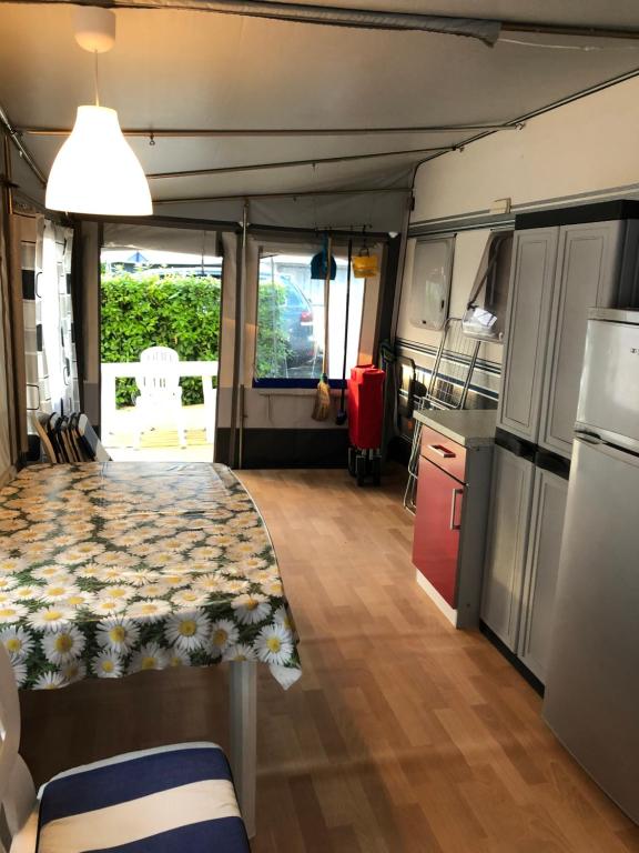 Kuchyň nebo kuchyňský kout v ubytování Caravan Cavallino - Valentini in Campeggio Union Lido