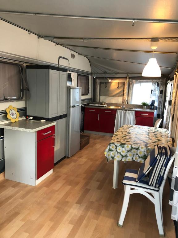 Kuchyň nebo kuchyňský kout v ubytování Caravan Cavallino - Valentini in Campeggio Union Lido