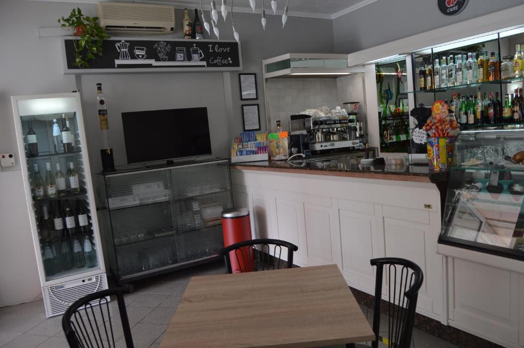 Lounge nebo bar v ubytování Pensione Rossi