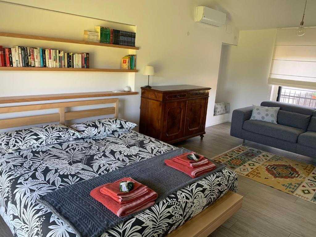 Postel nebo postele na pokoji v ubytování Cottage del fiume