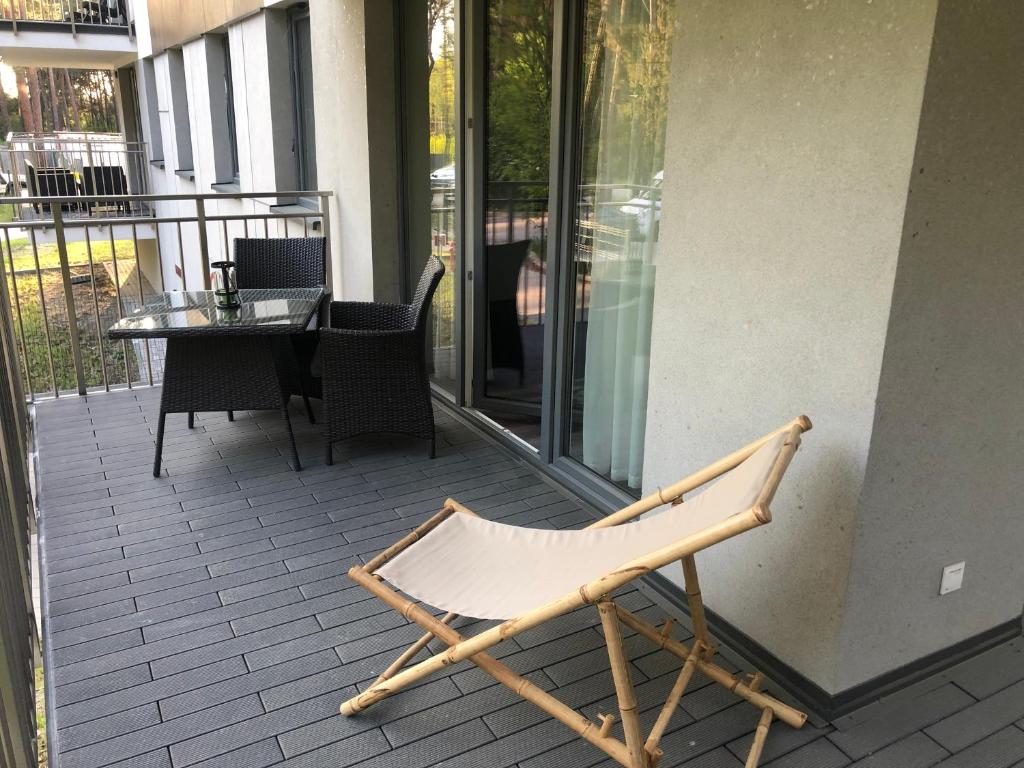 Patio lub wspólna przestrzeń na świeżym powietrzu w obiekcie Apartament Leśny No 4 Blue
