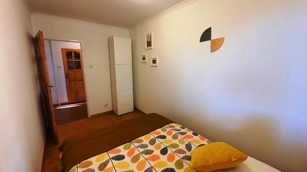 Posteľ alebo postele v izbe v ubytovaní Apartament Motylek
