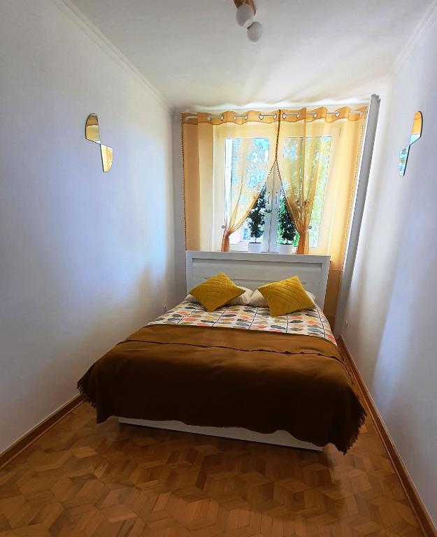 Posteľ alebo postele v izbe v ubytovaní Apartament Motylek