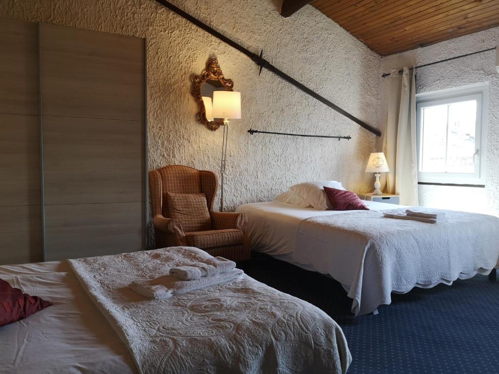 Postel nebo postele na pokoji v ubytování Il était 1 fois