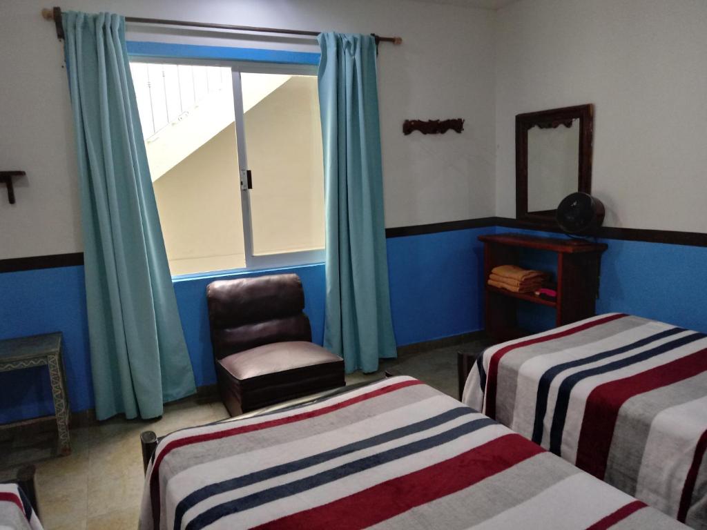 Postel nebo postele na pokoji v ubytování Hospedaje Del Campanero 19