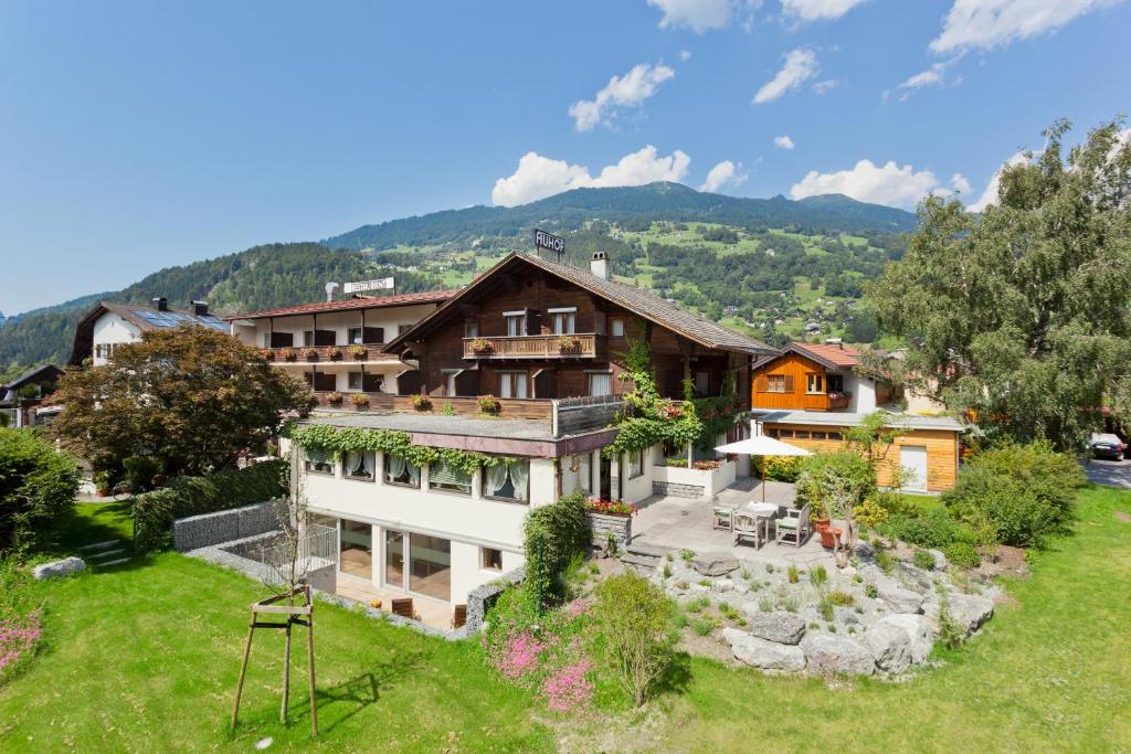 an aerial view of a house in the mountains at Hotel Auhof in Schruns-Tschagguns