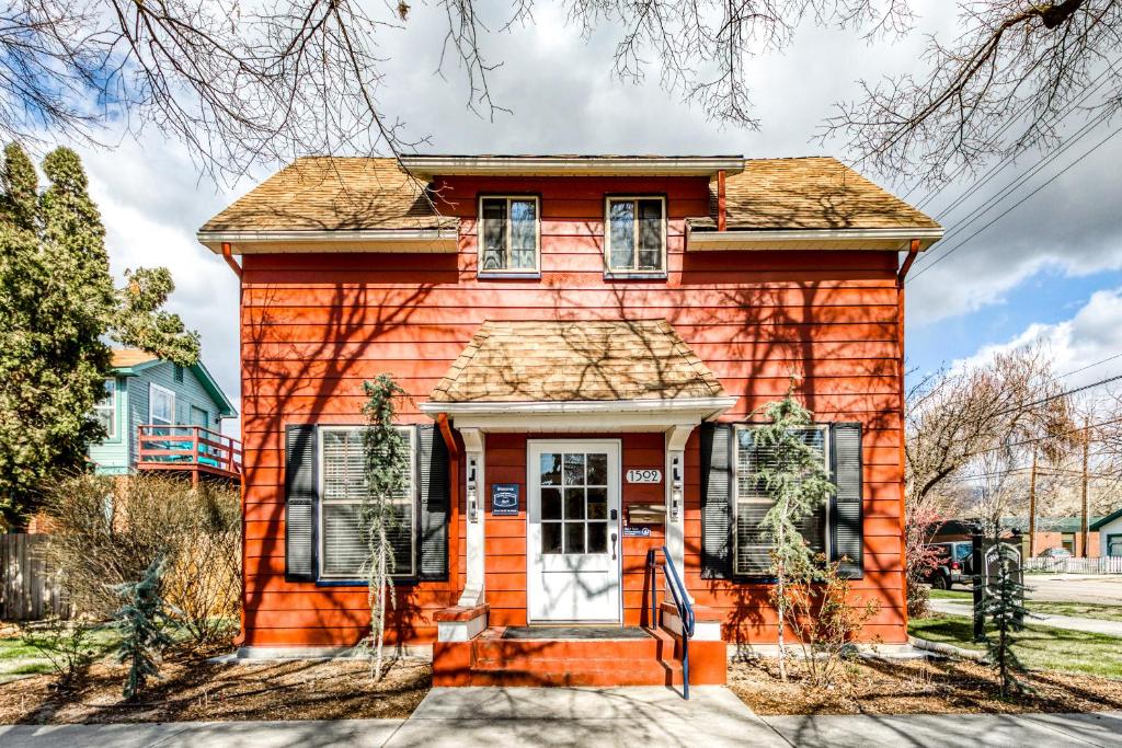 a red brick house with a white door at Franklin House in Boise