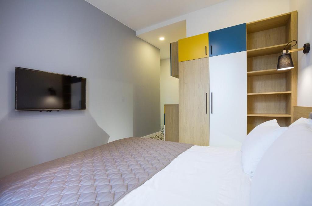 Postel nebo postele na pokoji v ubytování Partner Guest House Baseina