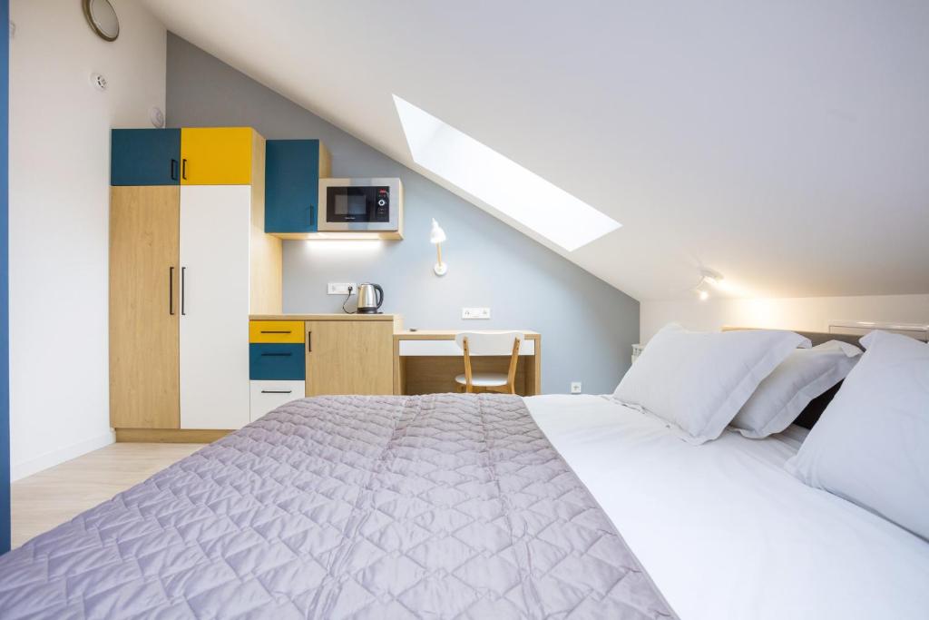 Postel nebo postele na pokoji v ubytování Partner Guest House Baseina