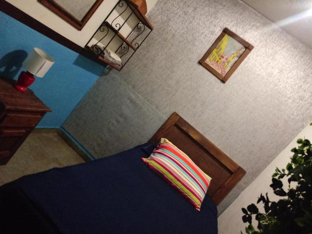 Postel nebo postele na pokoji v ubytování Hospedaje Del Campanero 19
