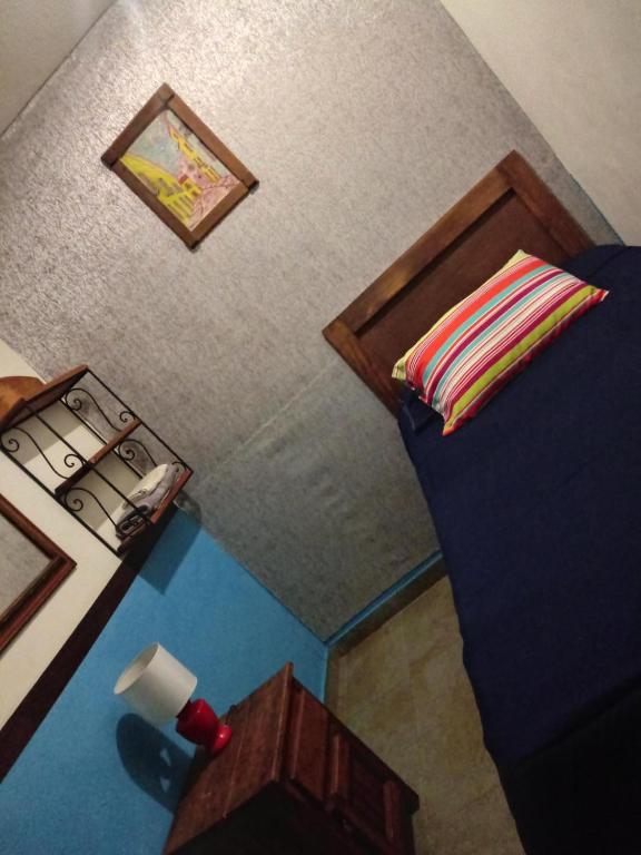 Postel nebo postele na pokoji v ubytování Hospedaje Del Campanero 19