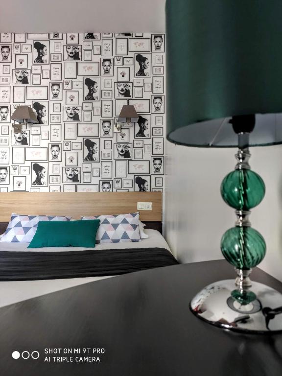 Postel nebo postele na pokoji v ubytování Celtic Hotel