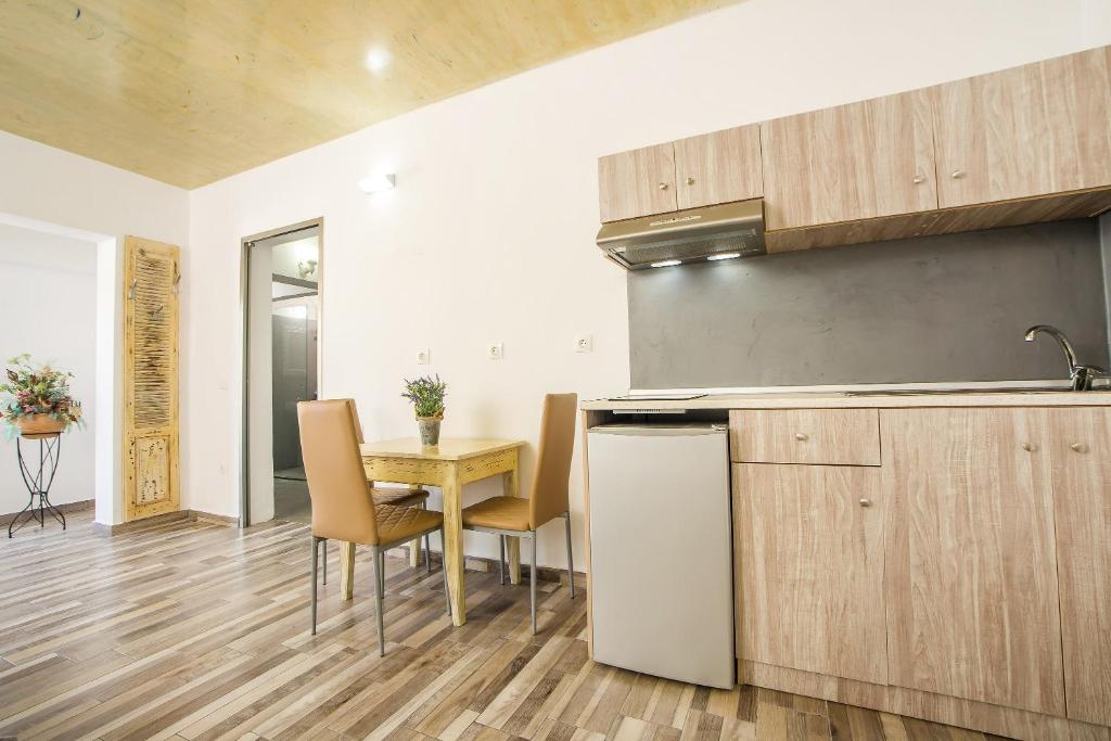 Kuchyň nebo kuchyňský kout v ubytování Lisabeth Apartments