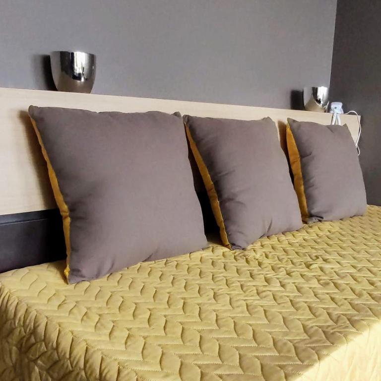 Postel nebo postele na pokoji v ubytování Celtic Hotel