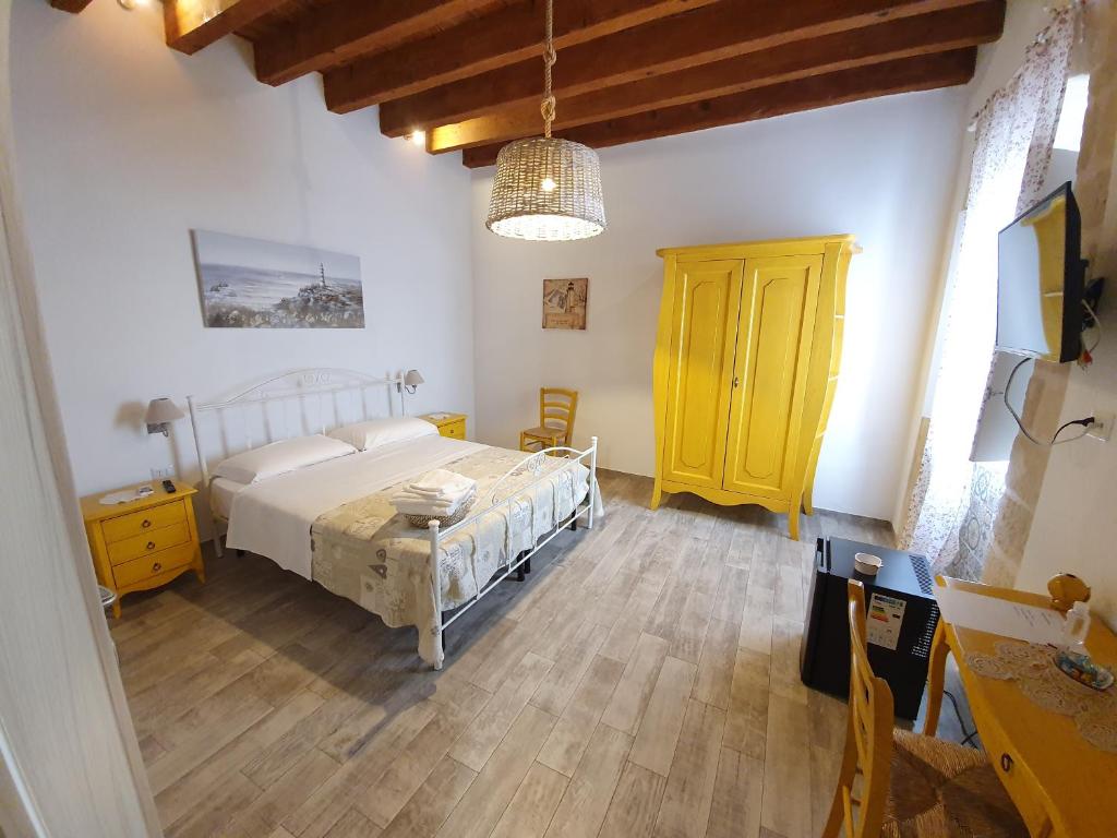 Postel nebo postele na pokoji v ubytování B&B La Terrazza di NonnAnna