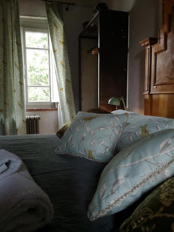 Postel nebo postele na pokoji v ubytování B&B Molino2Rosso