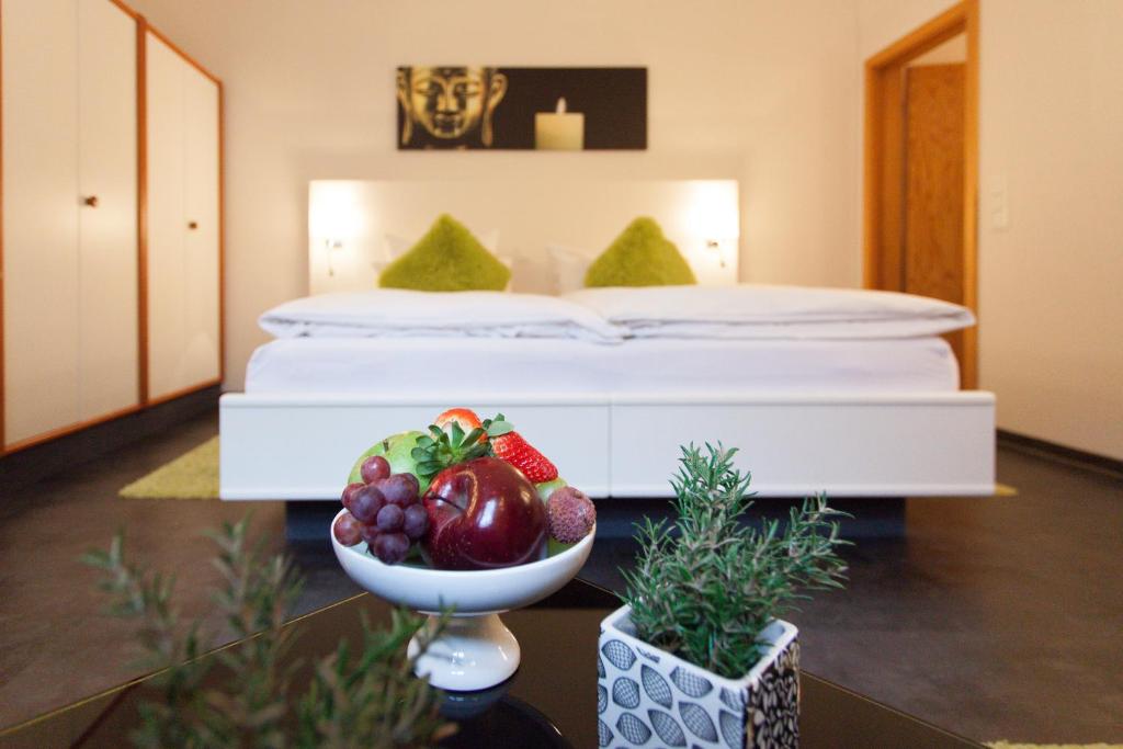 Postel nebo postele na pokoji v ubytování Hotel Am Grudenberg