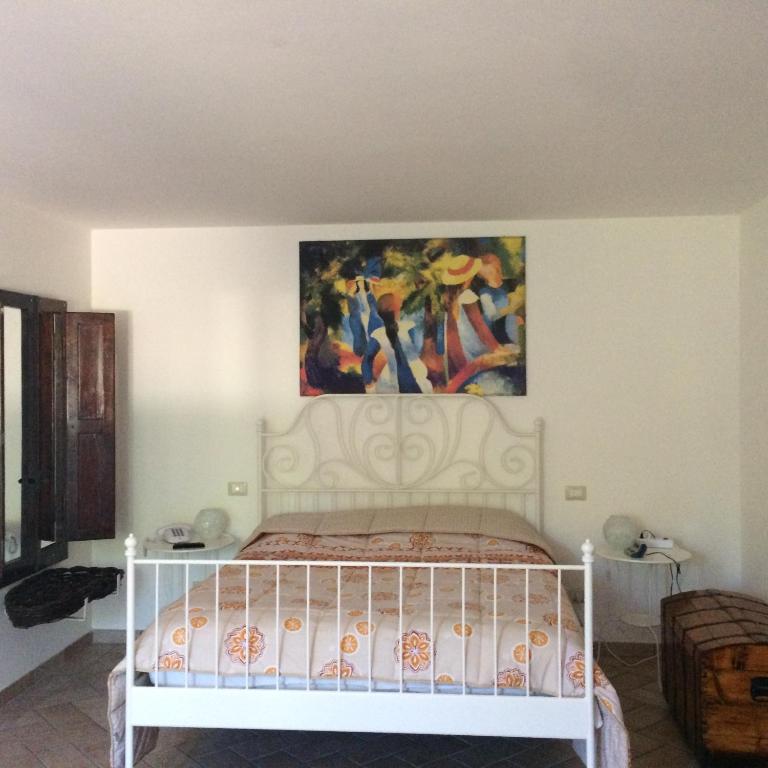 A bed or beds in a room at Cominium Benessere