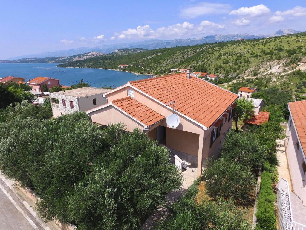 an aerial view of a house with a lake at Holiday Home Mia by Interhome in Anić