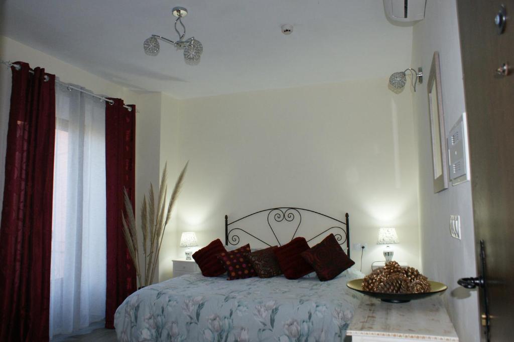Posteľ alebo postele v izbe v ubytovaní Hotel Rural Molino del Puente Ronda