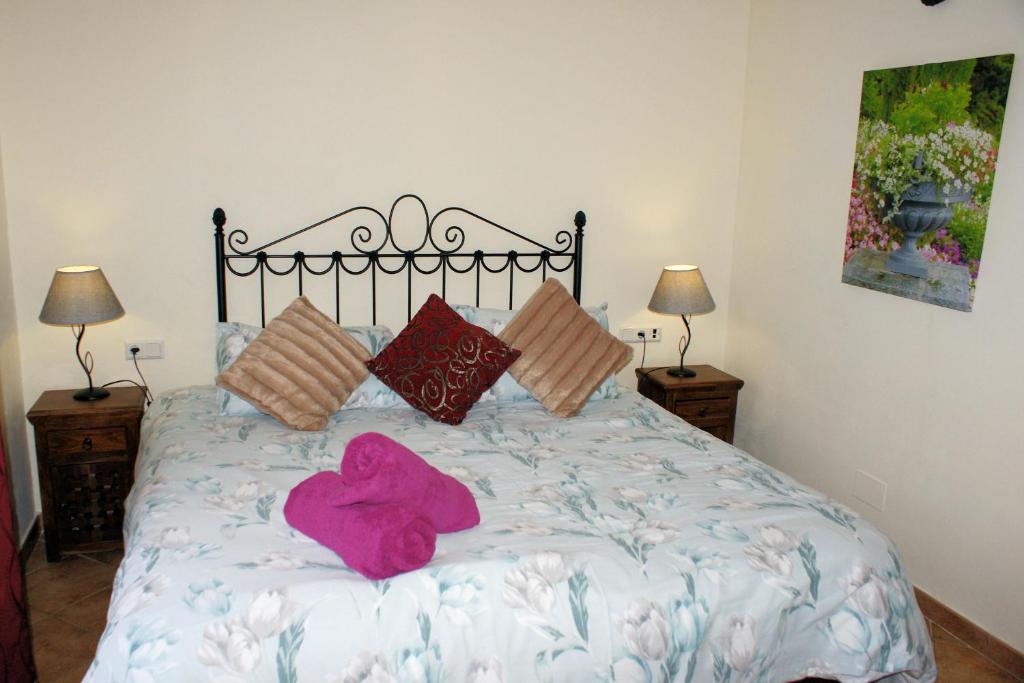 Posteľ alebo postele v izbe v ubytovaní Hotel Rural Molino del Puente Ronda