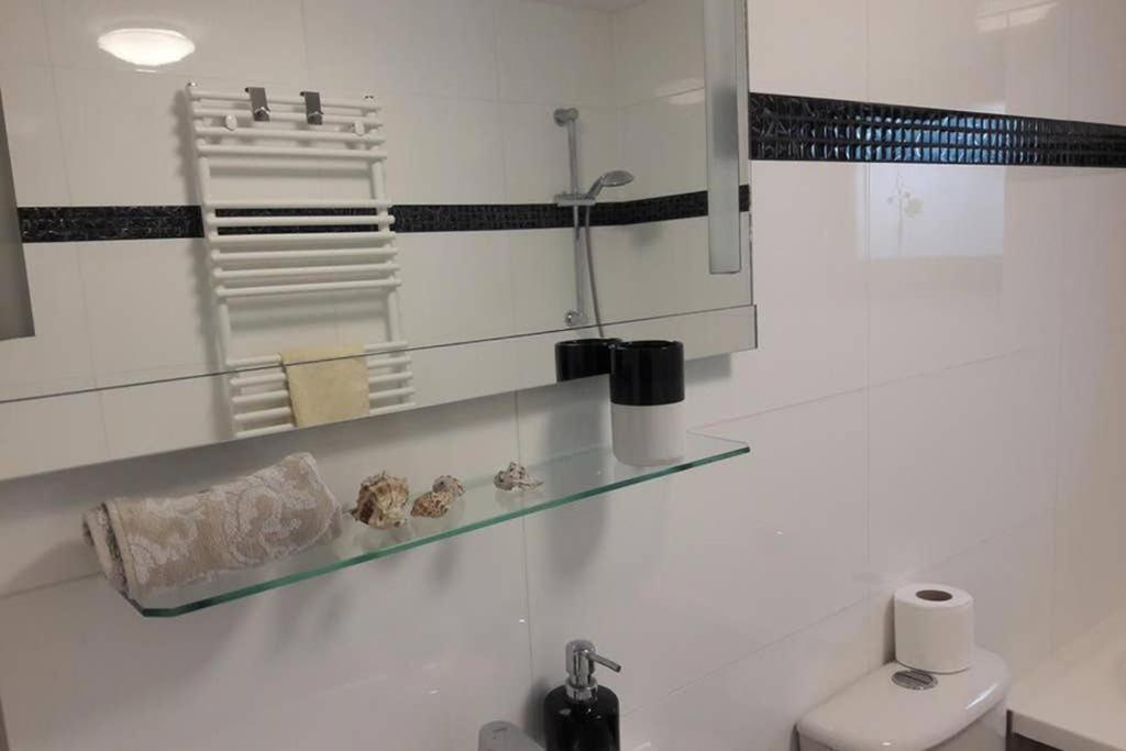 Kúpeľňa v ubytovaní Apartament z tarasem