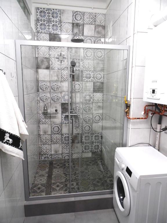 Kúpeľňa v ubytovaní Apartament Orchidea