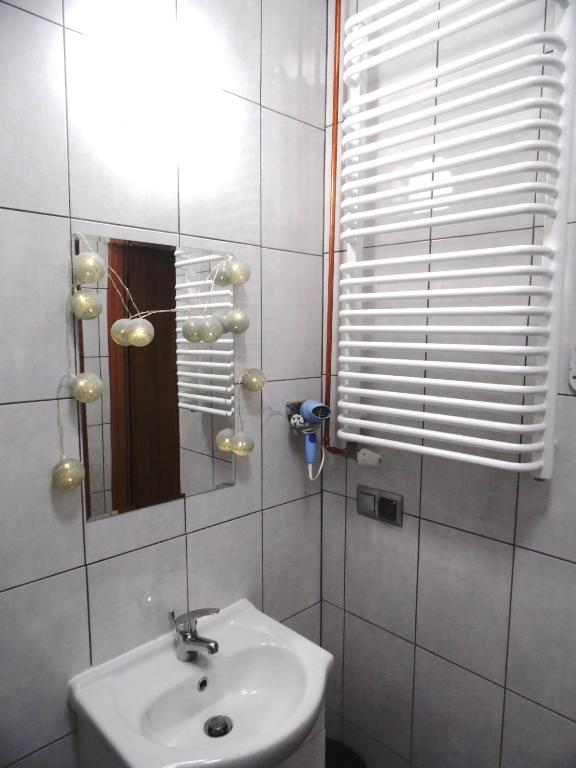 Kúpeľňa v ubytovaní Apartament Orchidea
