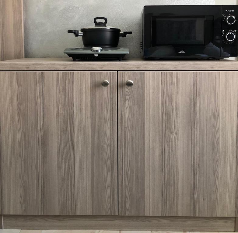 Kuchyň nebo kuchyňský kout v ubytování Hotel CK Park