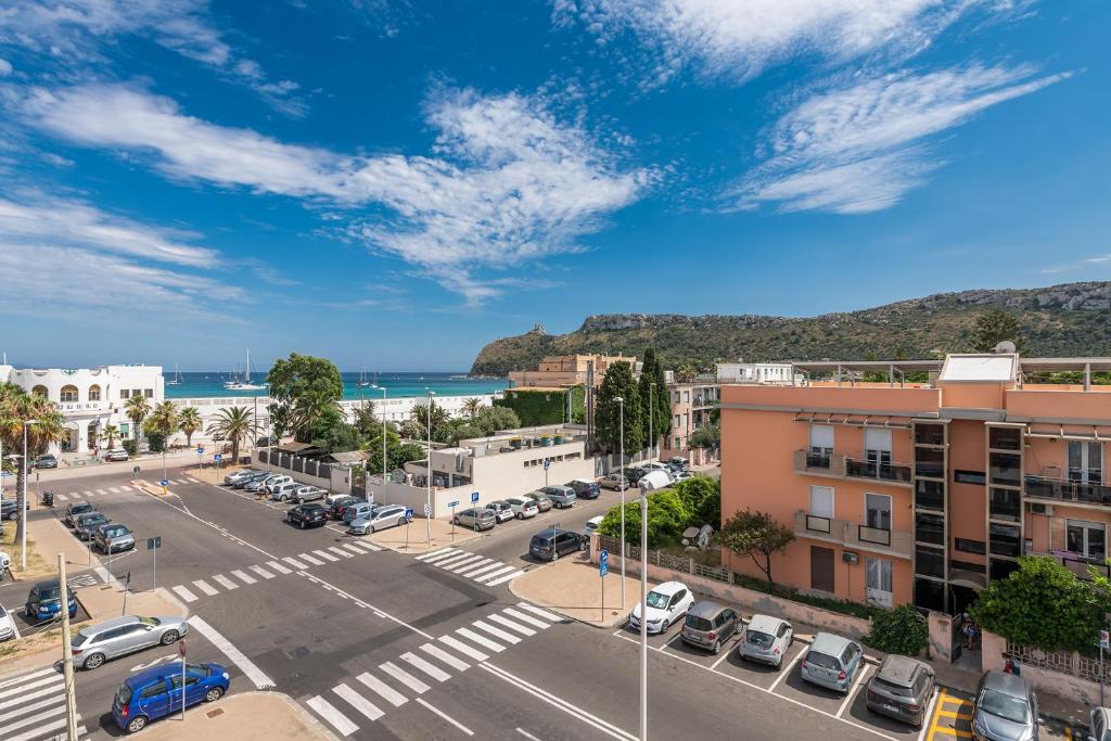 an aerial view of a parking lot in a city at A Luxury apartment at Cagliari Poetto Beachfront in Cagliari