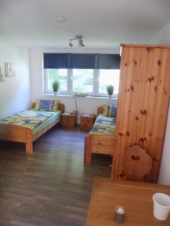 Postel nebo postele na pokoji v ubytování Pension Waldsauna