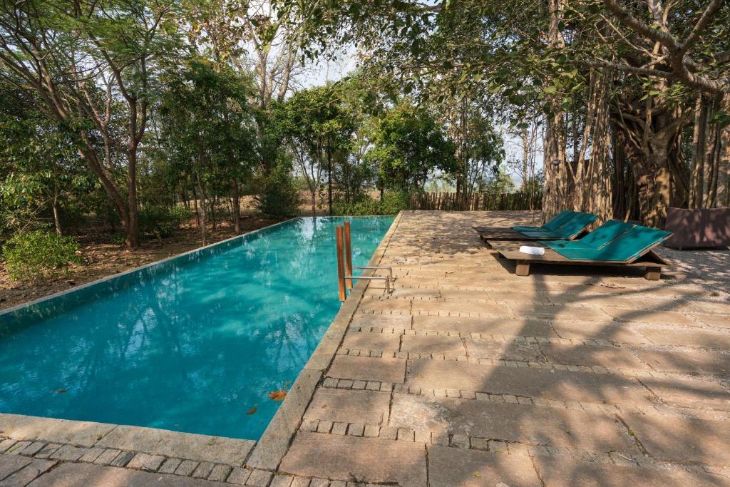 Bazén v ubytování Kaav Safari Lodge, Kabini nebo v jeho okolí