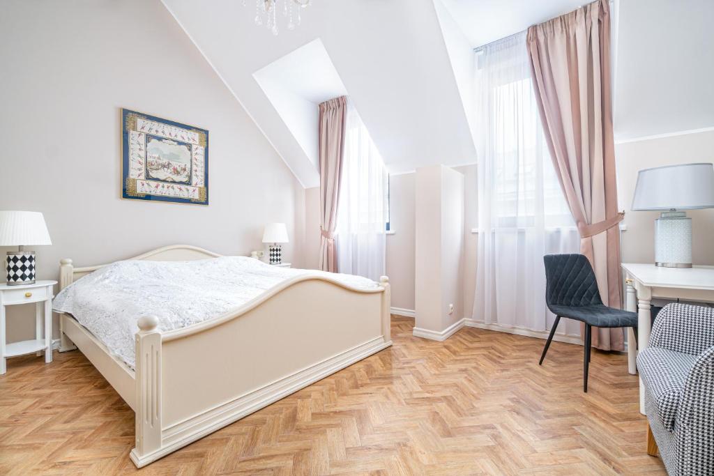 Postel nebo postele na pokoji v ubytování Forums Boutique Hotel