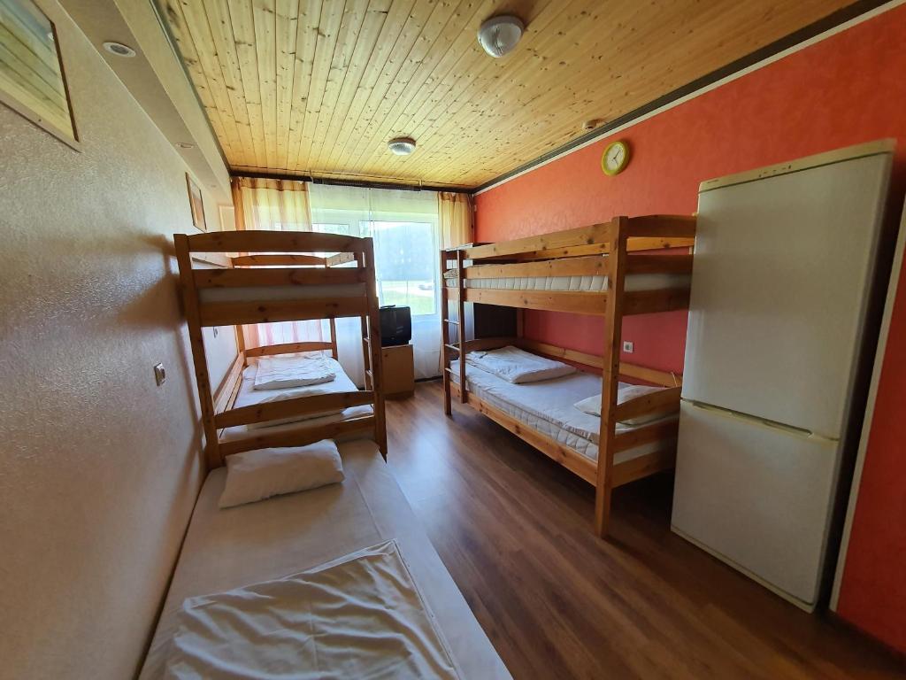 Postel nebo postele na pokoji v ubytování Gabriel