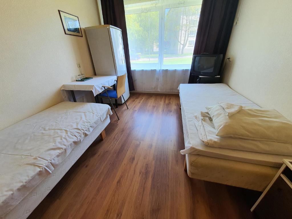 Postel nebo postele na pokoji v ubytování Gabriel