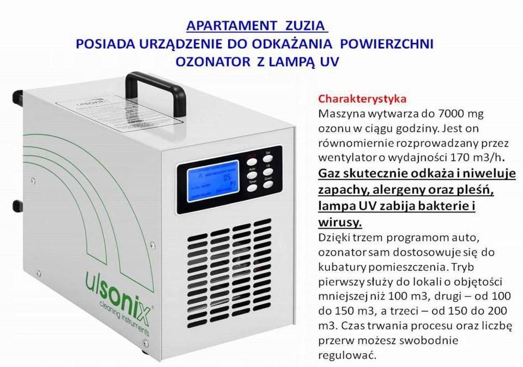 pudełko urządzenia do polimeryzacji doodleaminy w obiekcie Apartament Zuzia w Dźwirzynie