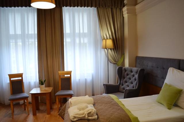 Posteľ alebo postele v izbe v ubytovaní Solanki Medical SPA