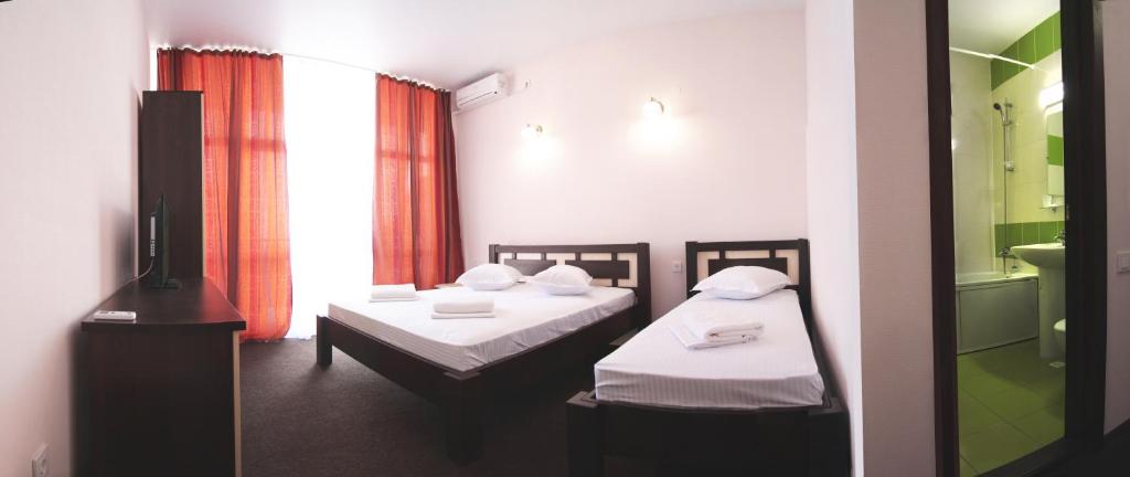 Postel nebo postele na pokoji v ubytování Berizka Park Hotel