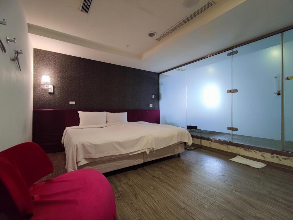 Postel nebo postele na pokoji v ubytování Walker Hotel - Zhengyi