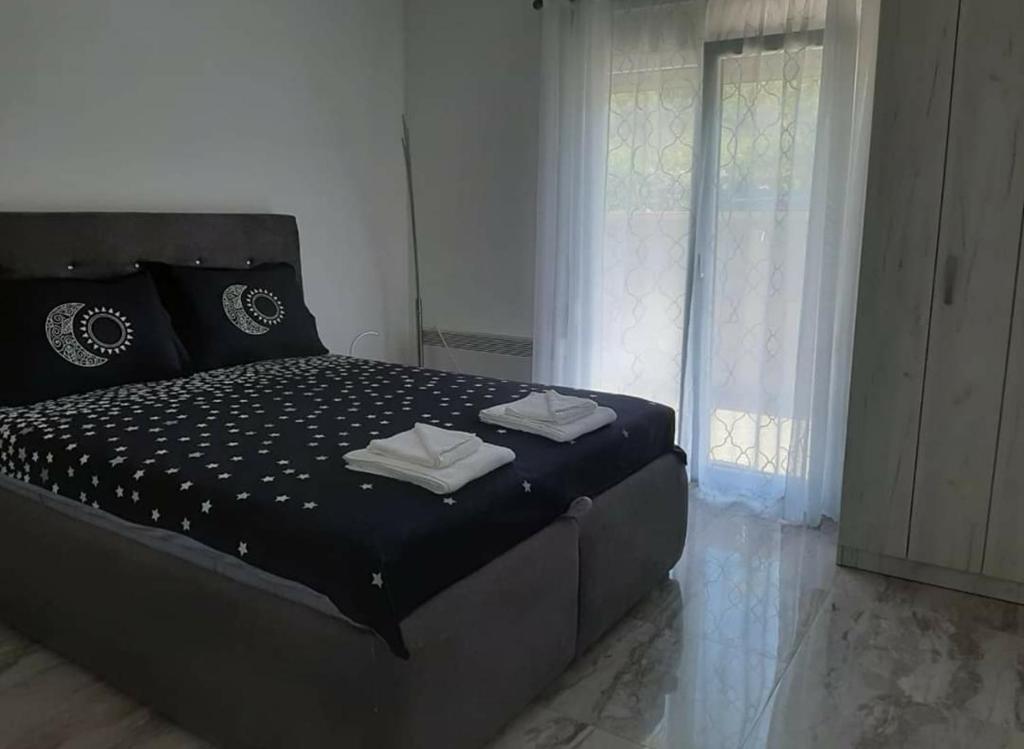 Postel nebo postele na pokoji v ubytování Apartments Merin
