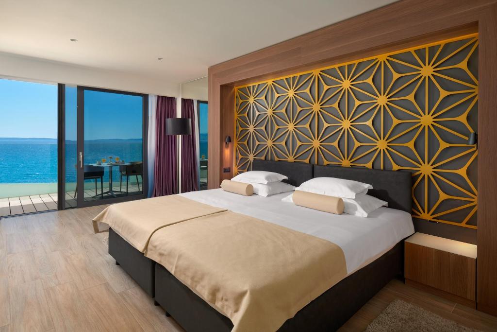 Krevet ili kreveti u jedinici u objektu Amphora Hotel